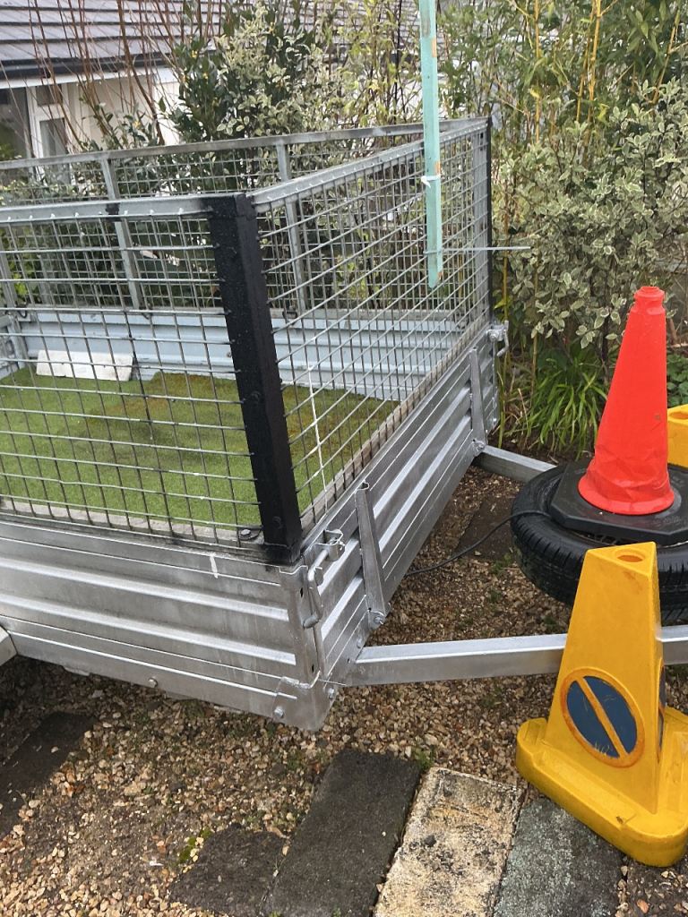 Seven by five caged single axle unbraked trailer,13 inch wheels,