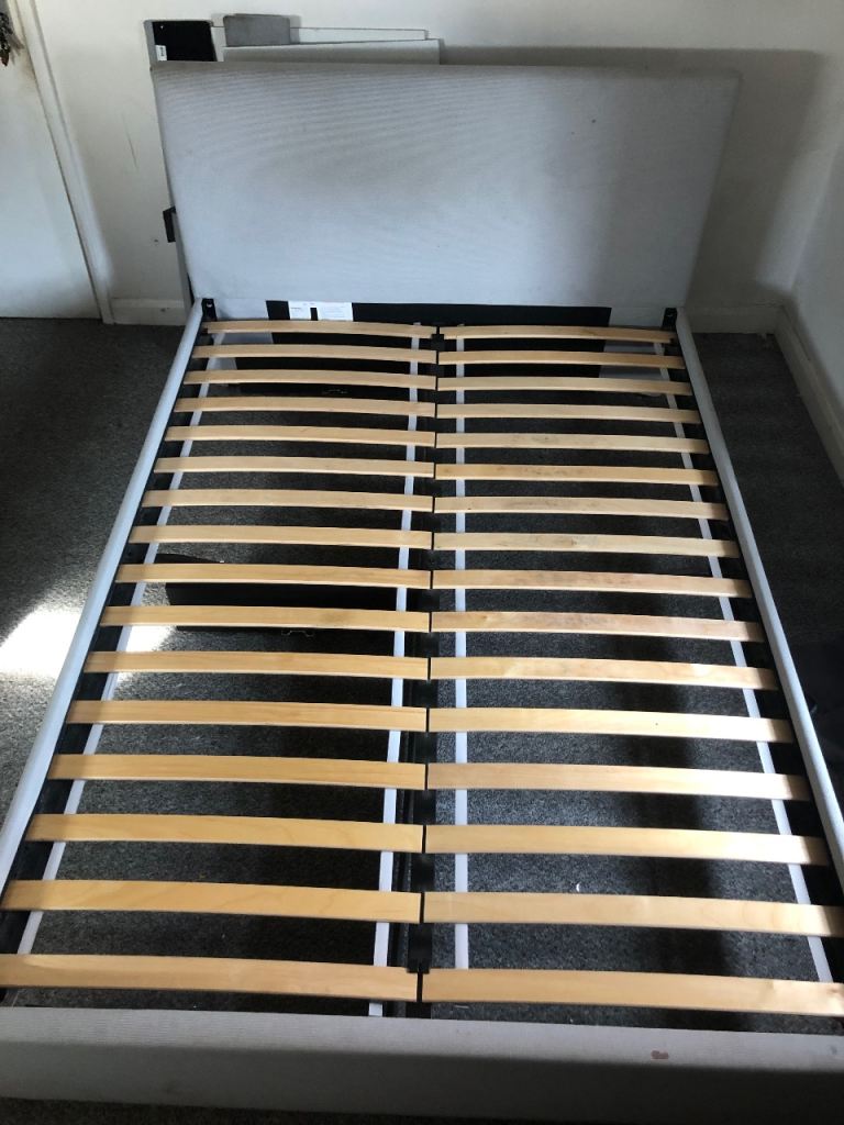 Ikea double bed frame with under storage drawers  and headboard included. 