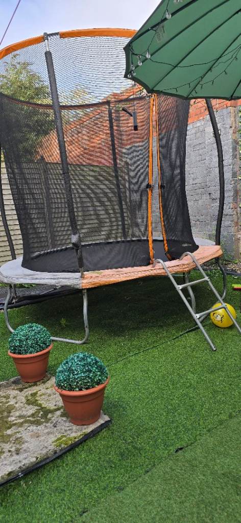 Large Garden Trampoline with Safety Net and Ladder – Good Condition