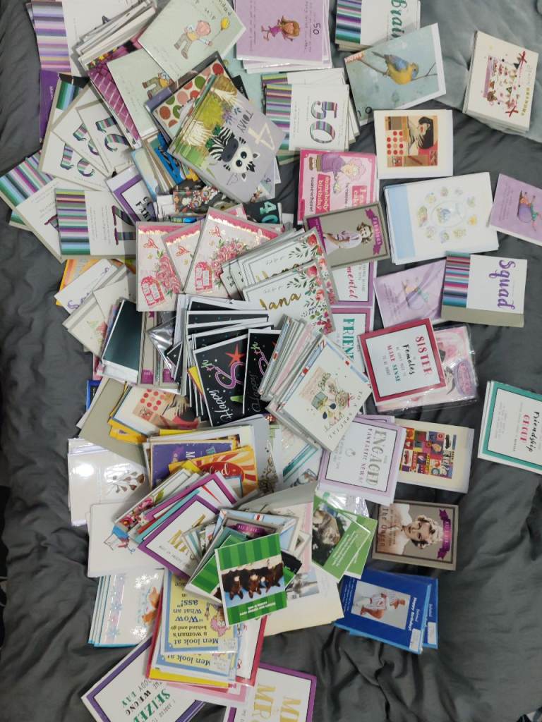 Over 500 unused cards,and card floor stand 