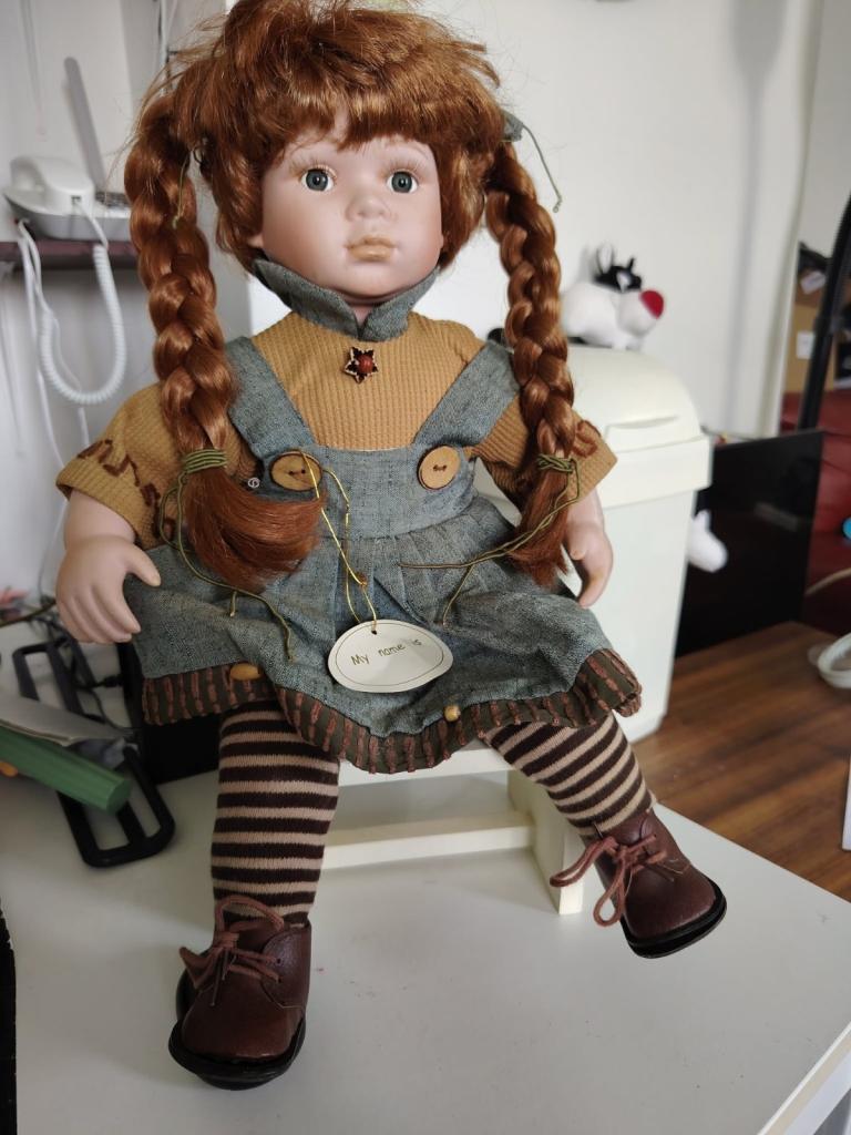 Vintage Style Porcelain Doll with Braids and Overalls – Good Condition