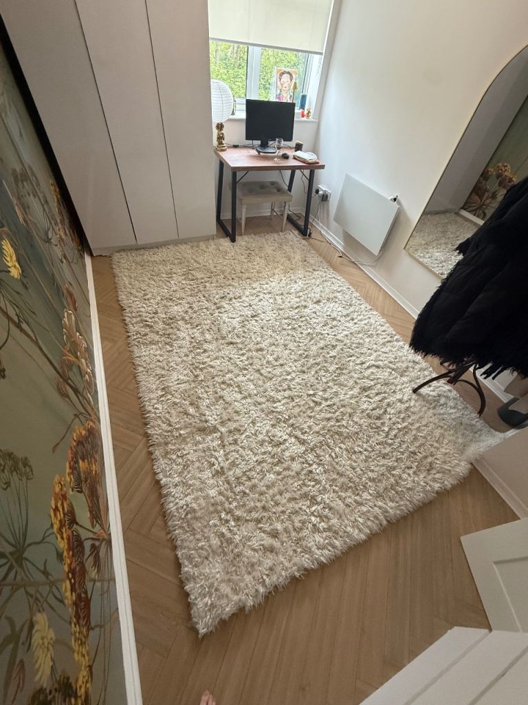 Large cream fluffy rug