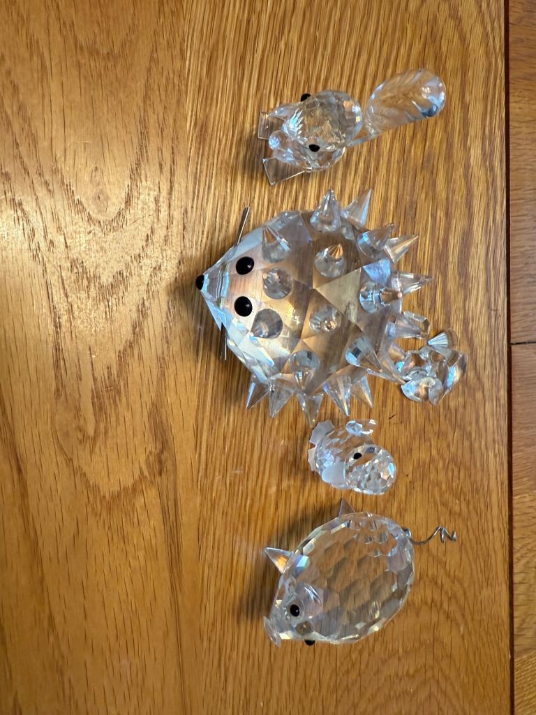 FOUR VINTAGE SWAROVSKI CRYSTAL ORNAMENTS