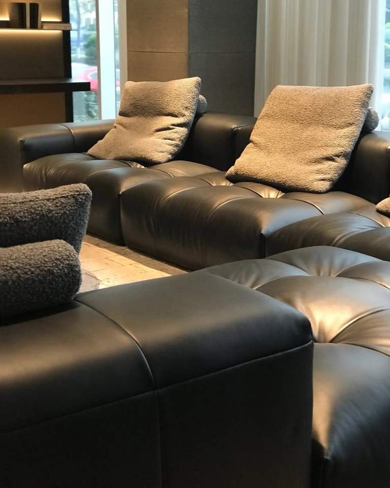 Black Leather Sofa with Cushions – Good Condition