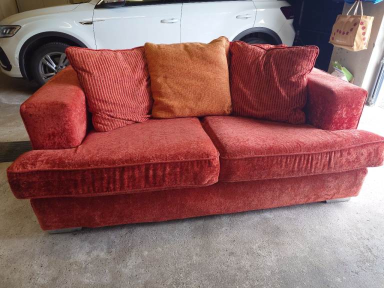 Uses 2/3 seater, burnt orange in colour