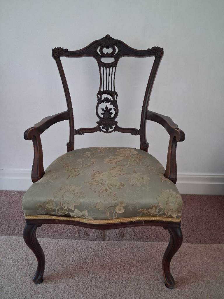 Antique upholstered wooden chair