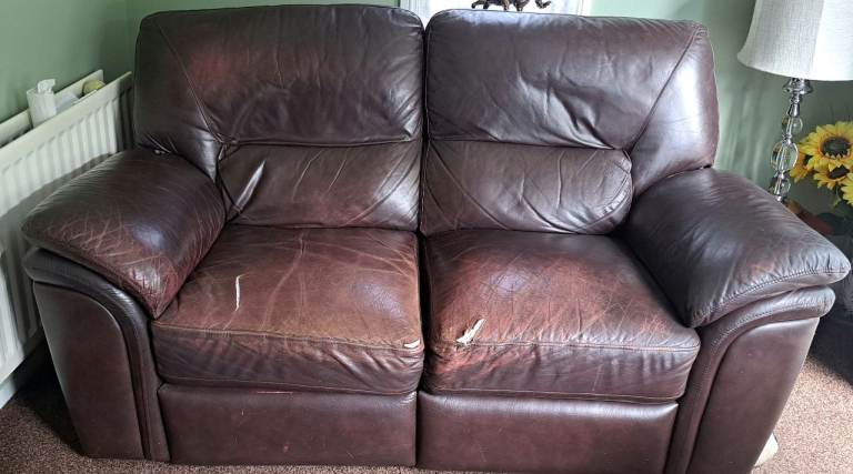 2 seater leather sofa, armchair and storage stool.
