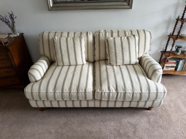 Two-Seater Sofa with Green Stripes – Good Condition