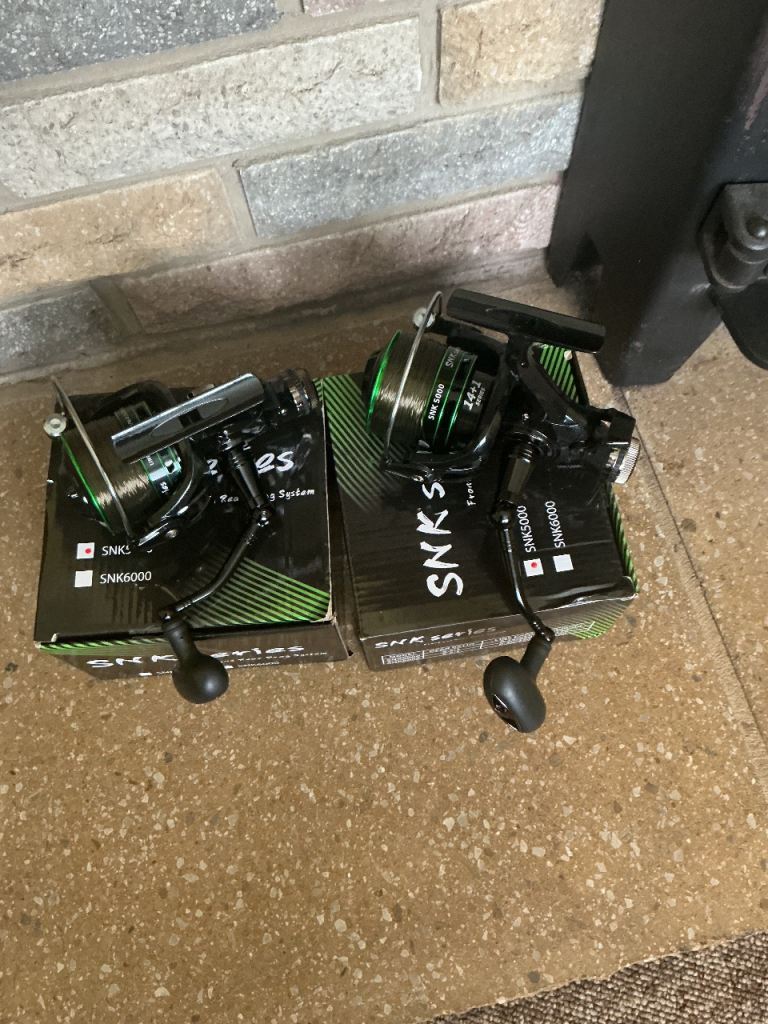 2 X SNK  series  5000 bate runner fishing reels 