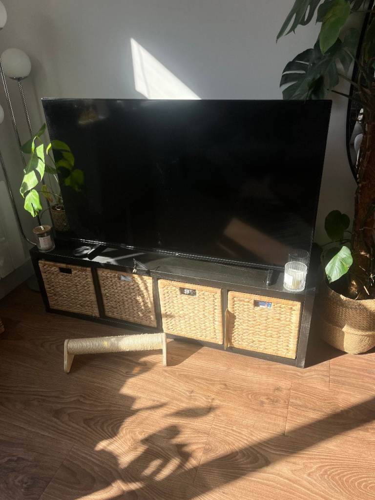 IKEA black shelving unit, if interested in the baskets can discuss