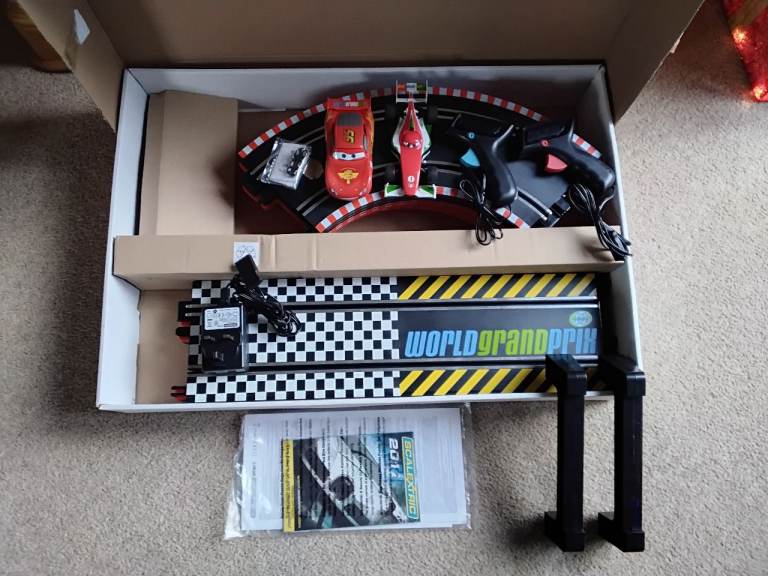 Scalextric - Disney Pixar Cars 2. 1:32 scale slot racing, World Grand Prix.