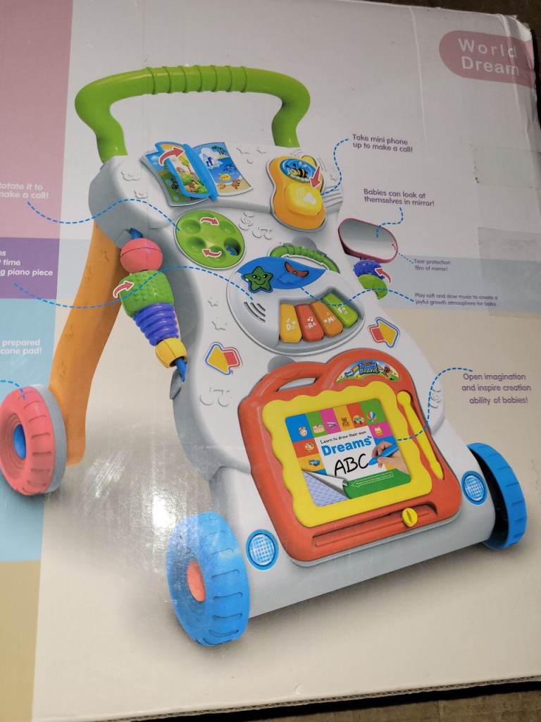 A new still boxed flat packed baby pladtic walk along with removable toys .