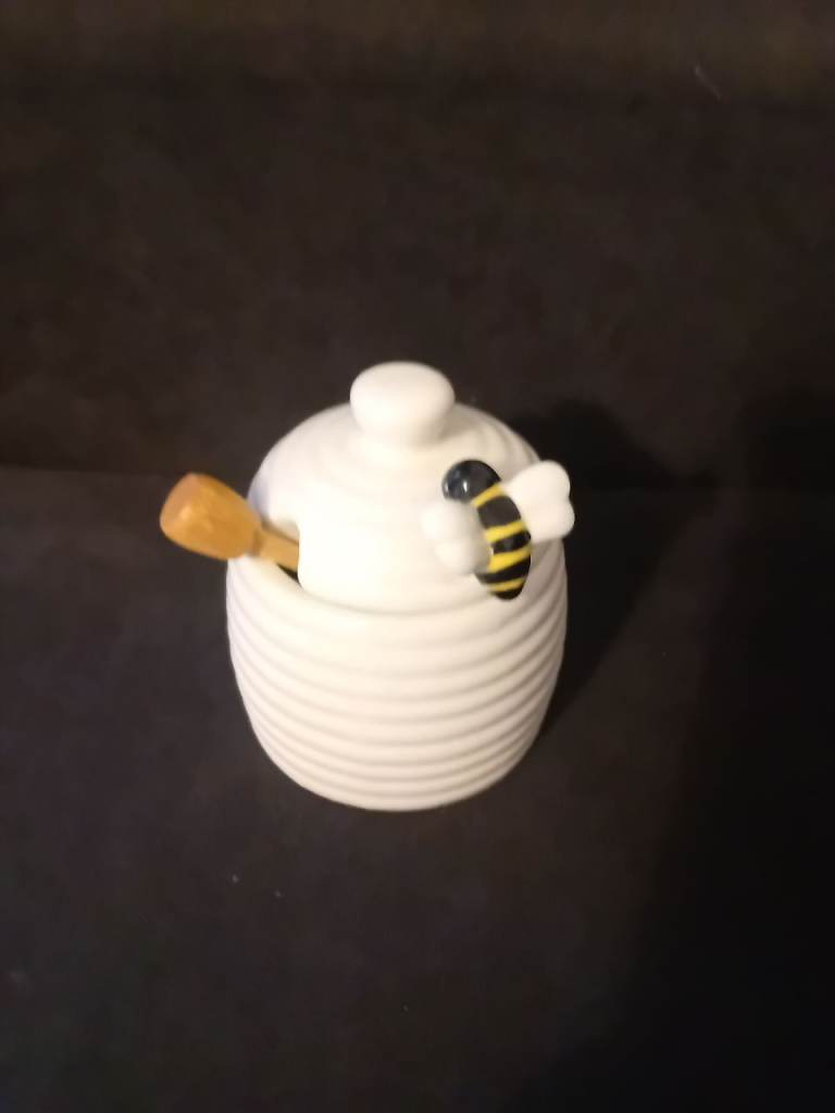 New Bee honey jar with wooden honey stick