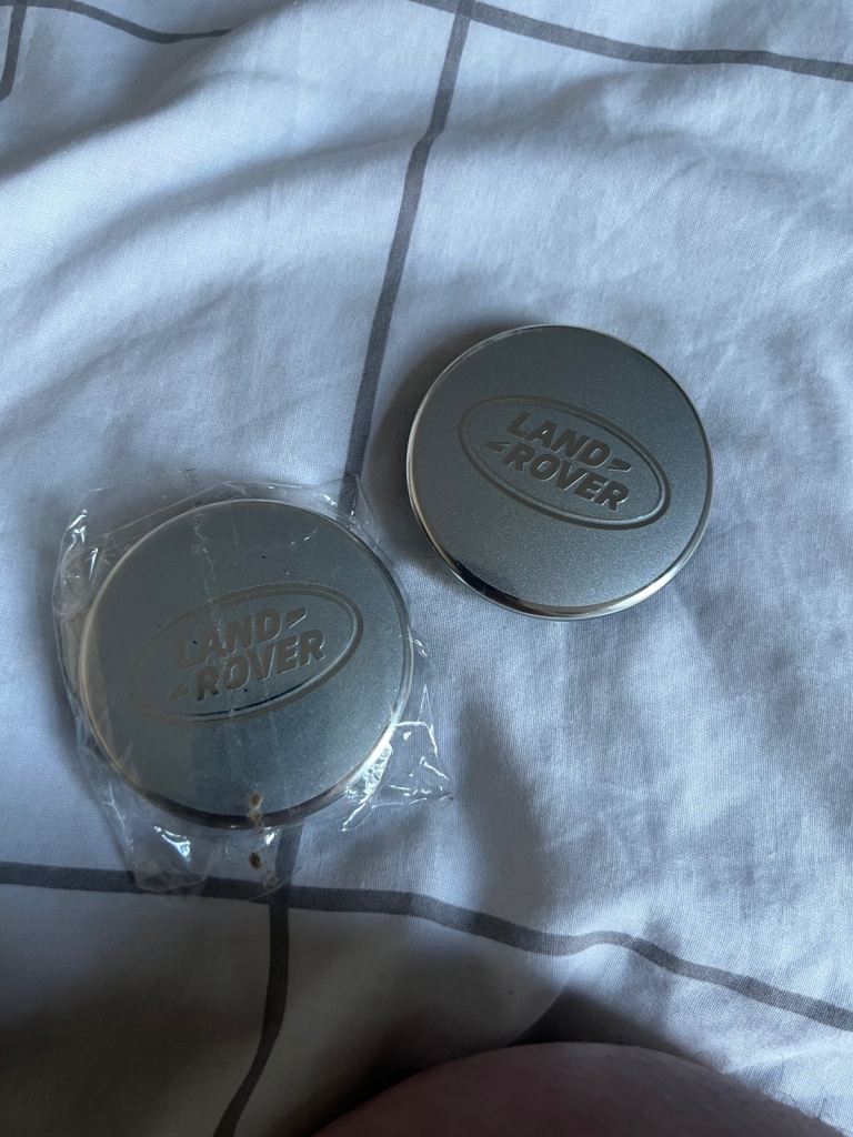 Two land rovers emblems 