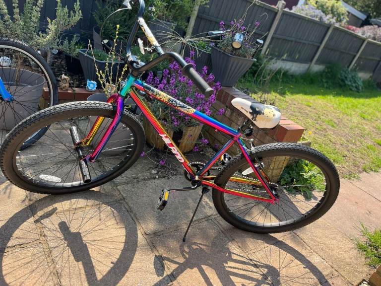 Brand new This rainbow-finished bicycle is a Hiland Redeem BMX bike, 