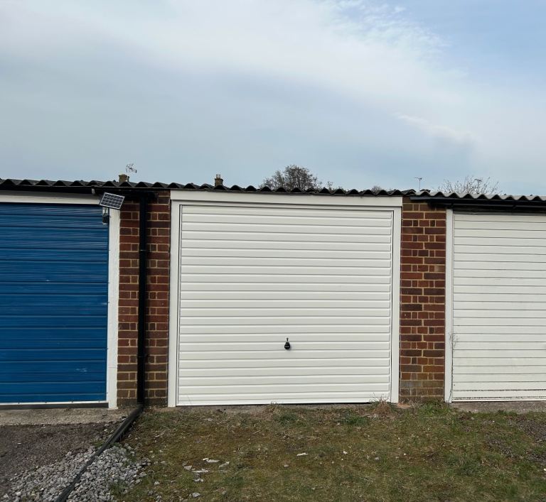 Freehold Garage and Parking Space in Church Crookham