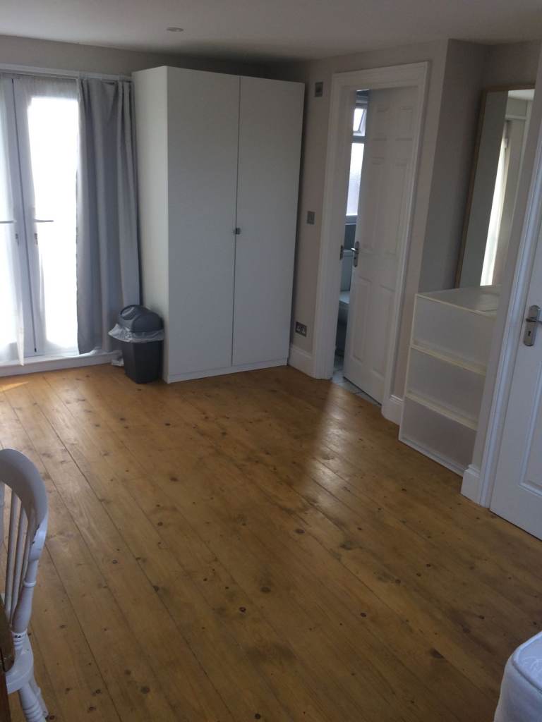 Double loft room with bathroom. House with garden