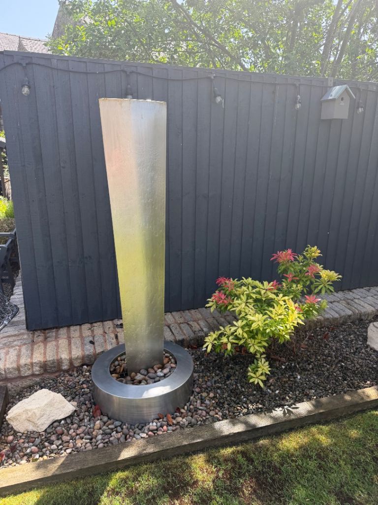 Designer stainless steel garden water feature