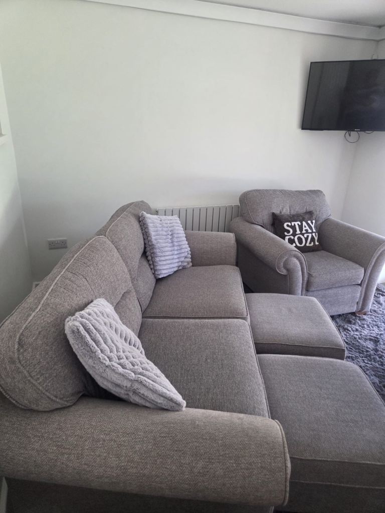 3 seater sofa, armchair and 2 footstools