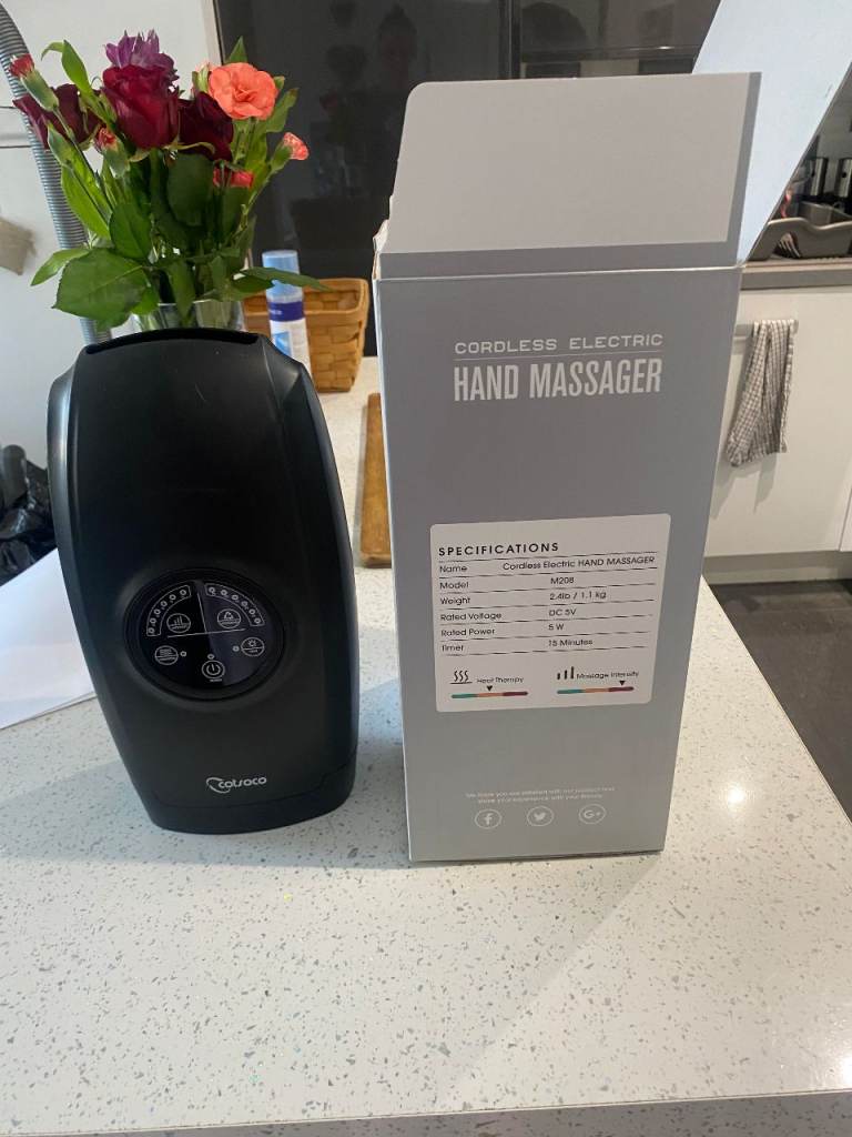 Hand massager with heat and compression as new - box opened only