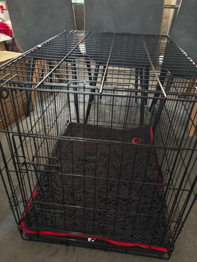 Used once medium dog cage with luxury pad 