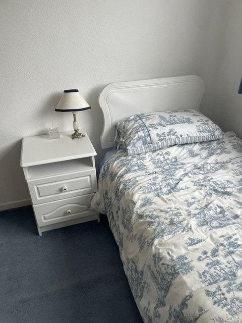 Single Bed and beside unit