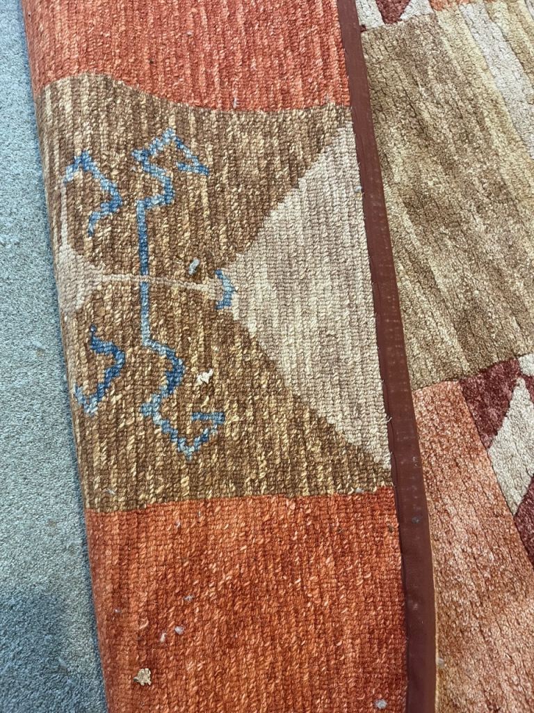 Lovely warm terracotta colours rug Large