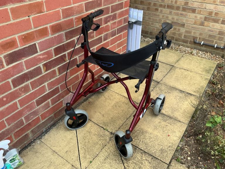 Red Rollator / Mobility Walker with Seat and Brakes – Good Condition