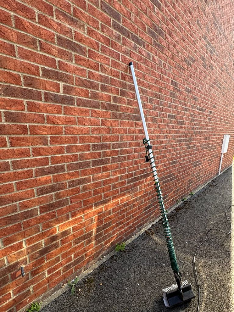 Cleaning pole for caravan or conservatory 