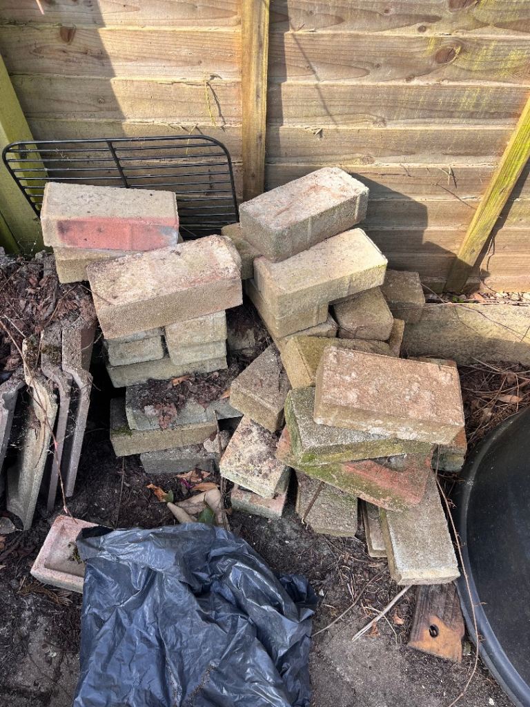 Free couple of piles of paving bricks
