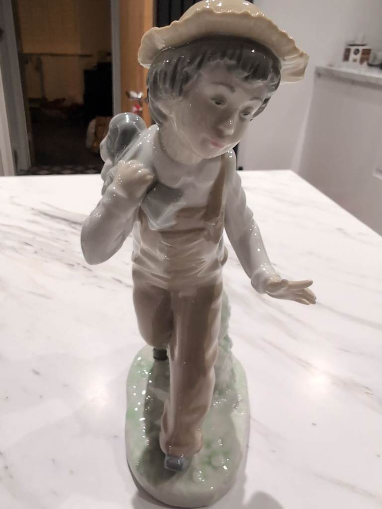 Lladro NAO porcelain figurine of boy
