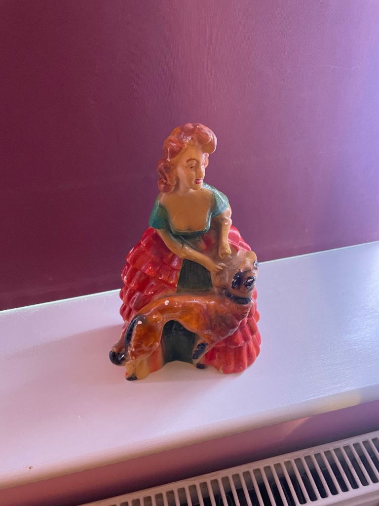 Chalkware lady with greyhound dog 