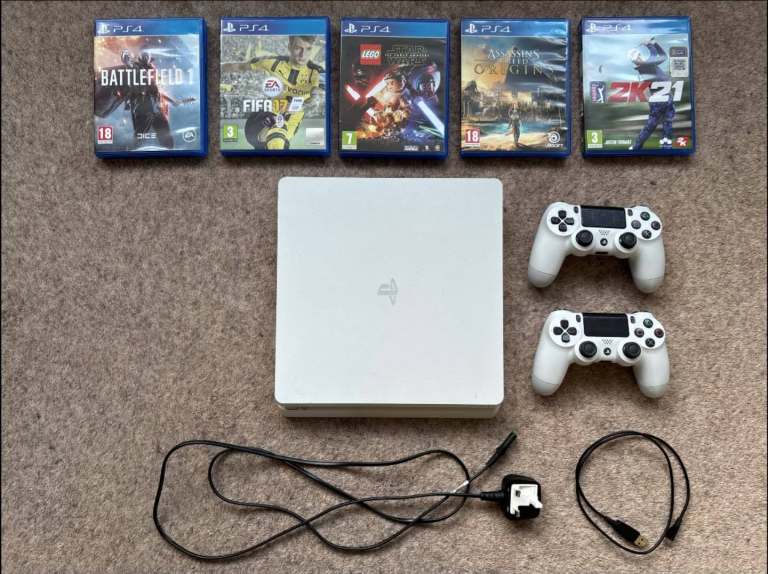 PlayStation 4 Slim 500GB Glacier White with 5 Games & 2 Controllers