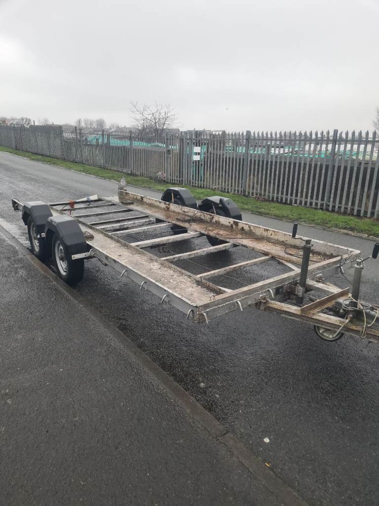 Tilt bed car trailer