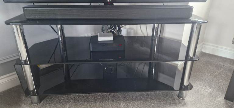 Black Glass TV Stand with Chrome Legs – Excellent Condition