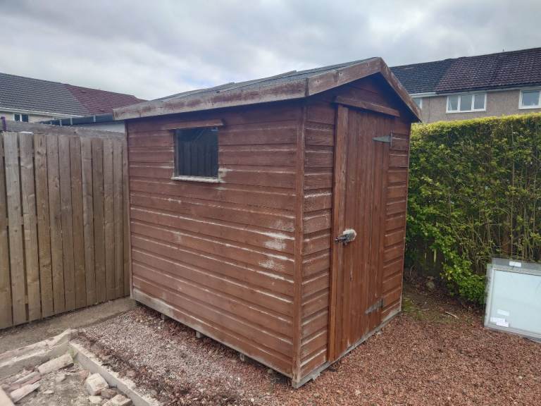 7x5 wooden shed. 