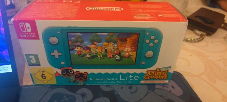 nintendo switch Lite +animal crossig:new horizons