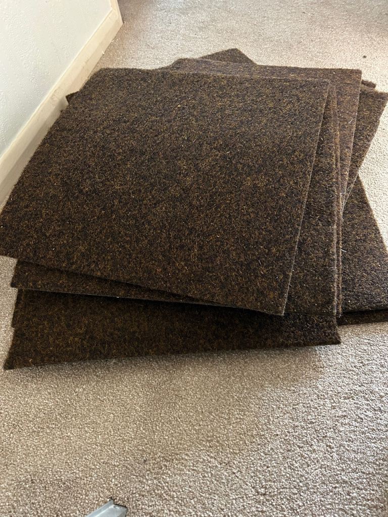 17 unused carpet tiles 20.5 inch sq 