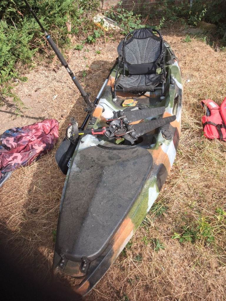 Fishing Kayak with Paddle, Seat, and Life Vest.