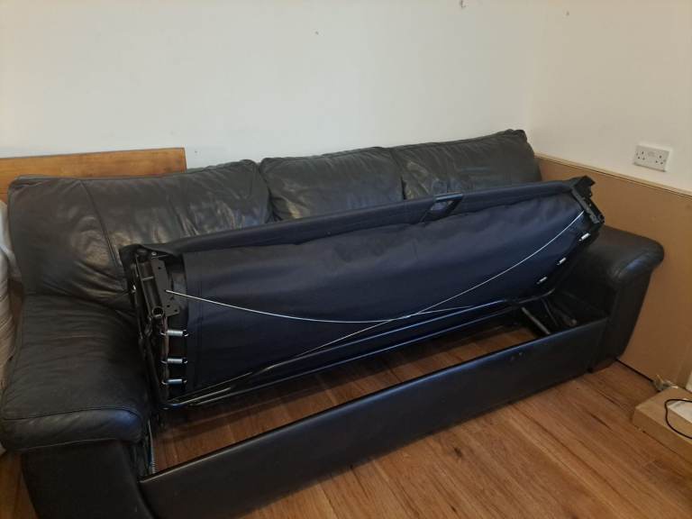 Black Leather 3 seater sofa bed £150