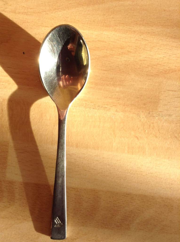 A 1990's Singapore Airlines Tablespoon with the SA logo on it