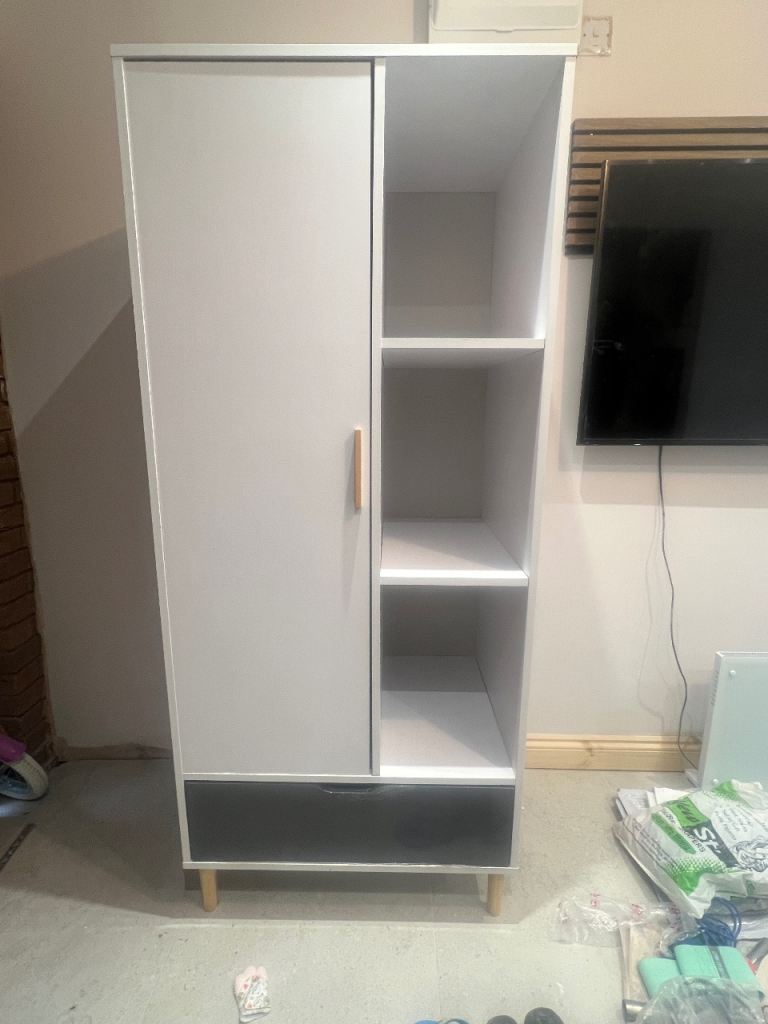 Modern wooden wardrobe with shelves