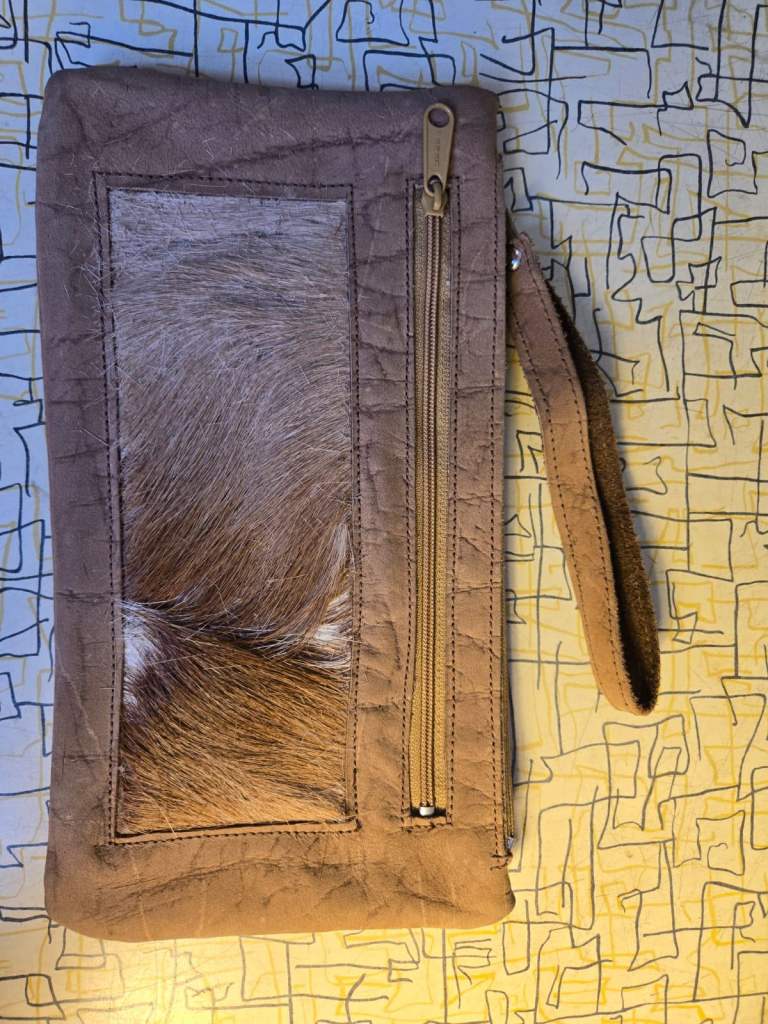 Springbok leather clutch bag