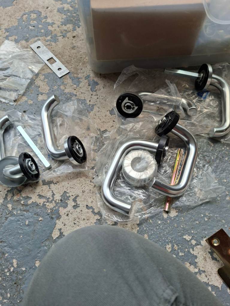 Various Door latch/handles & mechanisms all brand new with all parts Price for all parts.