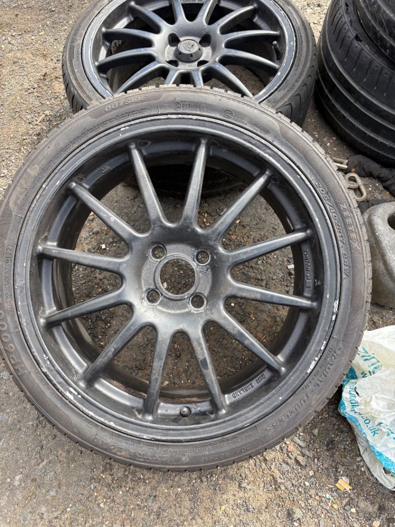 Pair of aftermarket 4x100 17 inch  wheels and tyres