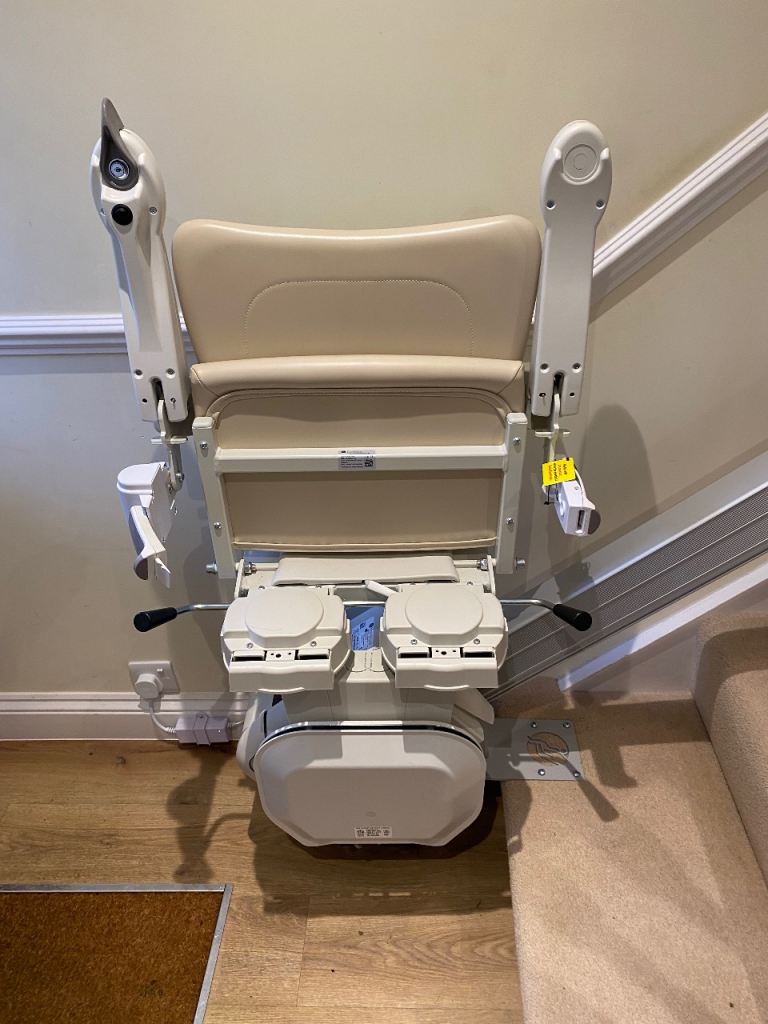 Handicare 1100 stairlift with two remote controls  