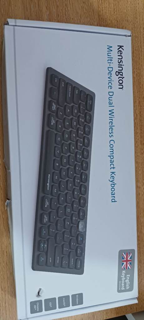 Multi device dual wireless compact keyboard