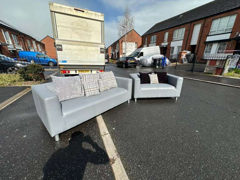 3 and 2 seater sofa in a grey leather   Very fresh condition   £299