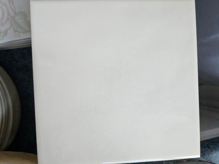 24 Plain cream 6" ceramic tiles left over from job