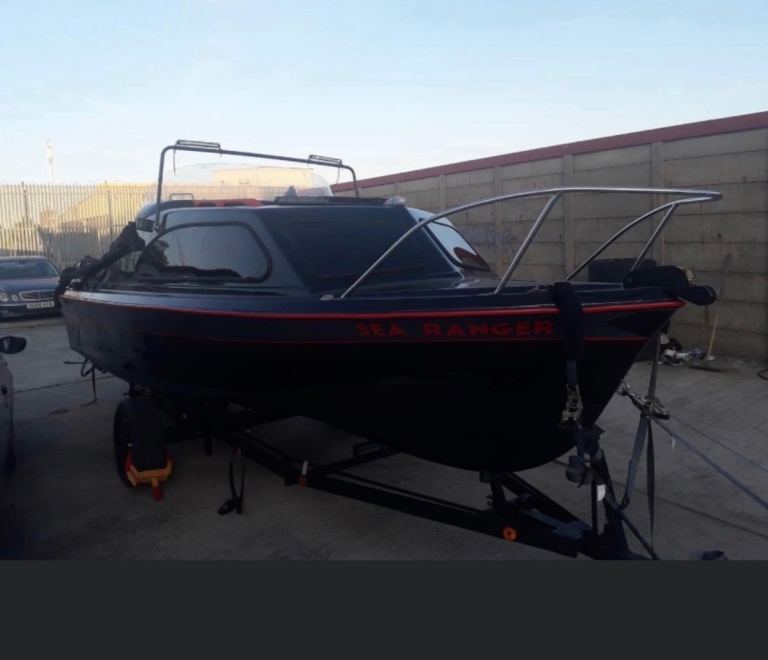 Black Shetland 535 Cabin Boat with Trailer
